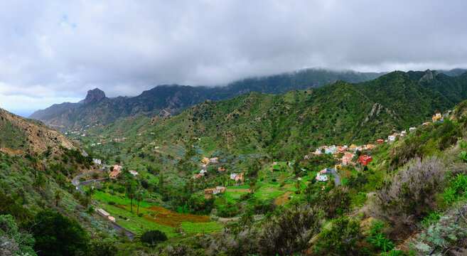 Spain, Province of Santa Cruz de Tenerife, Vallehermoso, Panorama of town located in green valley of La Gomera island