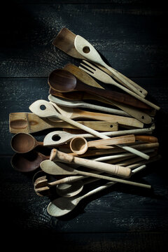 Pile of various wooden kitchen utensils