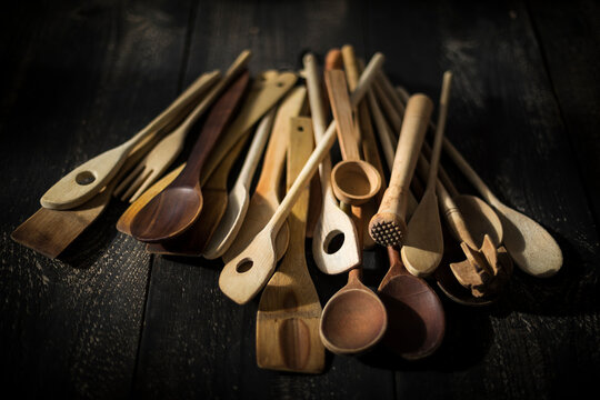 Pile of various wooden kitchen utensils