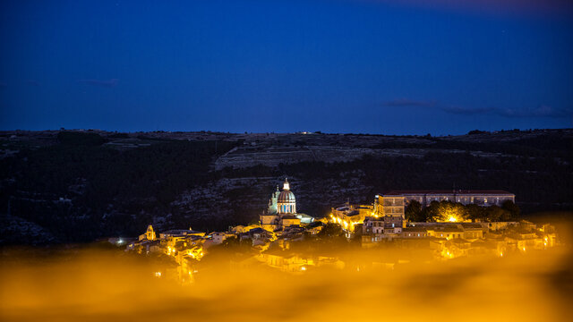 View from Ragusa Superiore to Ragusa Ibla with Duomo di San Giorgio at night, Ragusa, Sicily, Italy