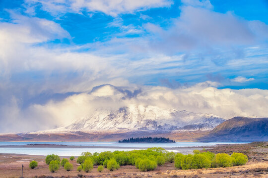 Scenic view of Lake Tekapo against snowcapped Mount Dobson, South Island, New Zealand