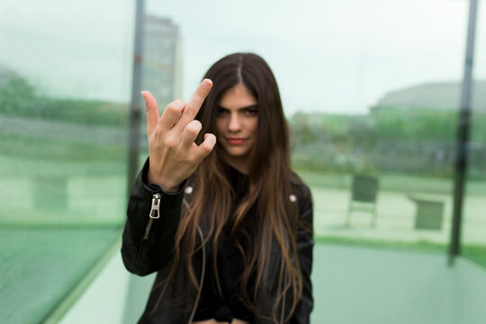 Young woman giving the finger