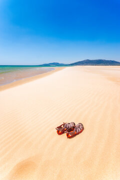 Spain, Andalucia, Tarifa, beach and sandals