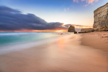Scenic view of sea at Gibson Steps against cloudy sky during sunset, Victoria, Australia