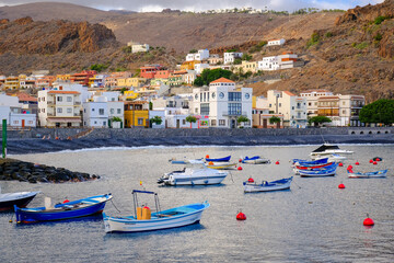 View of "Playa de Santiago" port and behind the neighborhood with the same name. La Gomera island (Canary Islands, Spain)