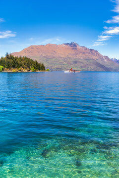 Mid distance view of TSS Earnslaw in Lake Wakatipu against sky Queenstown, South Island, New Zealand