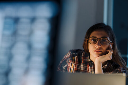 Portrait of tired freelancer in the evening