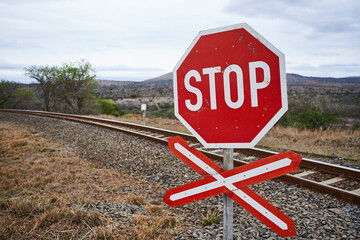 Stop sign at a railway track, KwaZulu-Natal, South Africa
