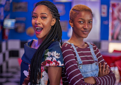 Portrait Of Two Women In Very Different Styles