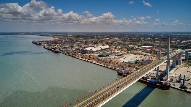Mozambique, Katembe, Aerial view of container ship sailing under Maputo-Katembe Bridge