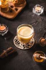 turmeric latte on a dark background