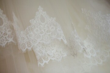 Lace and embroidery with beads on fabric
