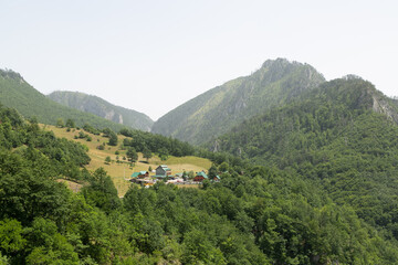 Fototapeta na wymiar A mountain village on top of a hill