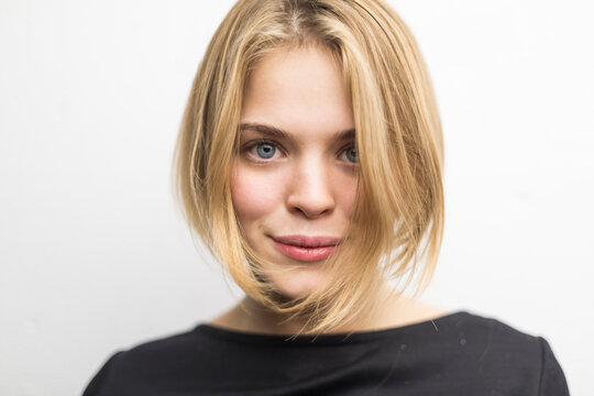 Portrait of blond young woman with bob hairdo