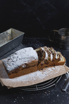 Marble cake with icing sugar, sliced