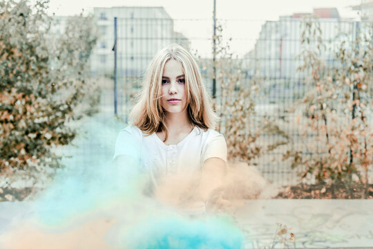Girl with Holi powder colours, Germany