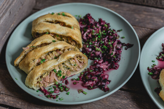 Ham courgette strudel with pear and carrot salad, cream cheese mustard with pine nuts