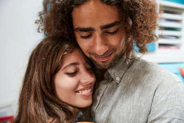 Portrait of affectionate young couple