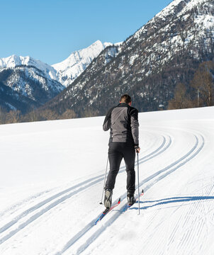 Austria, Tyrol, Achensee, man doing cross country skiing