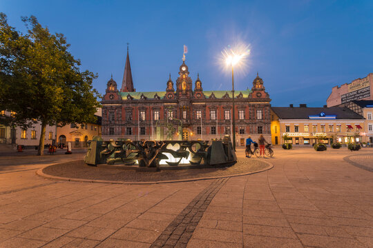 Illuminated town hall against blue sky at night in Malmo, Sweden