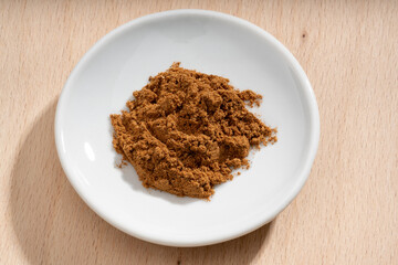 Detailed and large close up shot of gingerbread on a small plate