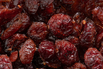 Detailed and large close up shot of dried cranberries.