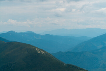 Fototapeta premium Summer mountains on a cloudy day. mountain landscape. background 