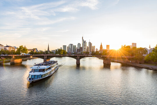 Excursion ship in River Main against sky during sunset at Frankfurt, Germany