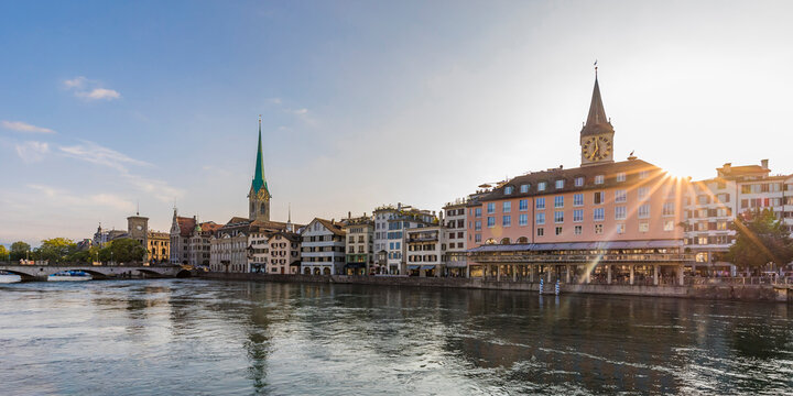 Switzerland, Canton of Zurich, Zurich, River&Ocirc;&oslash;&Omega;Limmat&Ocirc;&oslash;&Omega;and old town waterfront buildings at sunset
