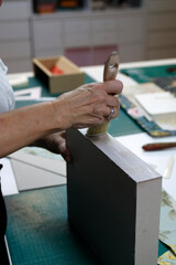 Gluing the cover of a book