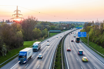 Germany, Baden-Wuerttemberg, traffic on Autobahn A8 at sunset