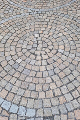 The texture of the gray road in the old part of the city, the background.