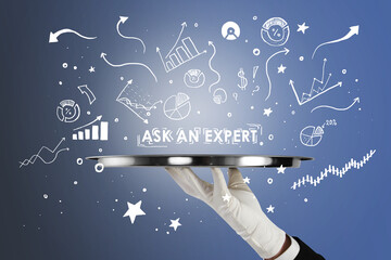 Male hand holding silver tray with business sketch and chart on blue background. Ask an expert...