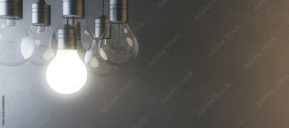 Poster glowing light bulb on blurry wide concrete wall background. idea, innovation, solution and invention