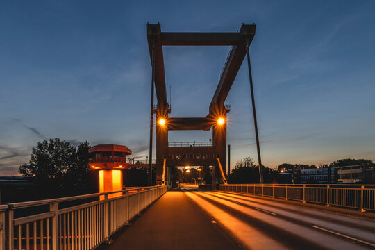 Germany, Hamburg, Reiherstieg bridge illuminated at dusk