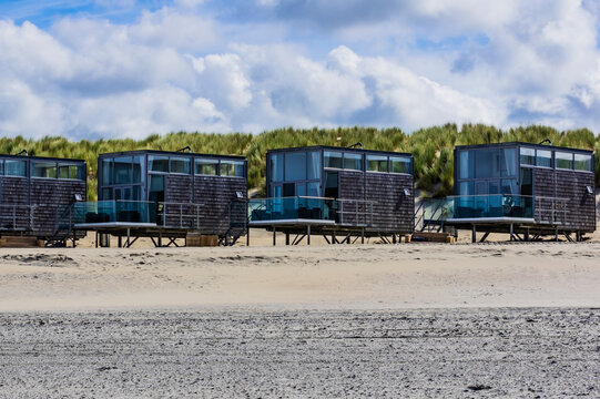 Netherlands, Zeeland, Domburg, row of modern houses on sandy beach