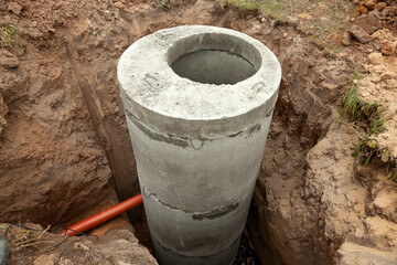 Installation of underground tank for sewage system.