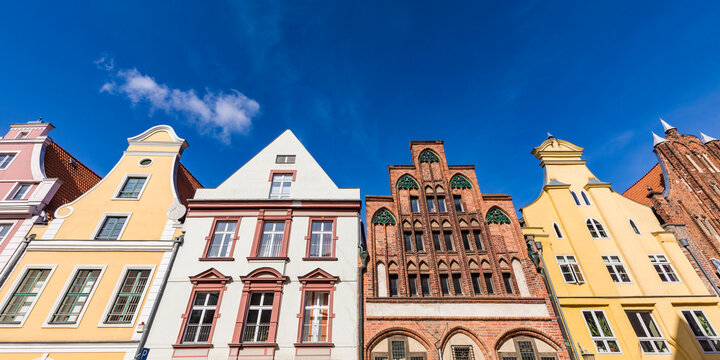 Germany, Mecklenburg-Western Pomerania, Stralsund, Low angle view of row of old town residential buildings