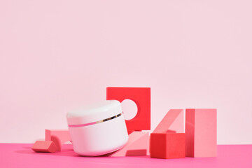 white mockup jar of cream on a pink podium on a pink background, bottles for perfume or serum
