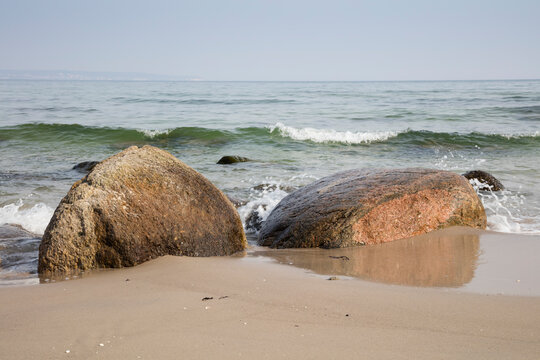 Germany, Ruegen, baltic seaside resort Binz, erratic blocks at the beach
