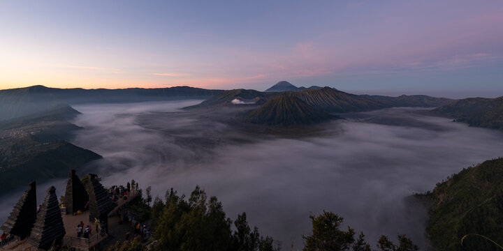 Indonesia, East Java,&Ocirc;&oslash;&Omega;Scenic panorama of Mount Bromo shrouded in thick fog at dawn
