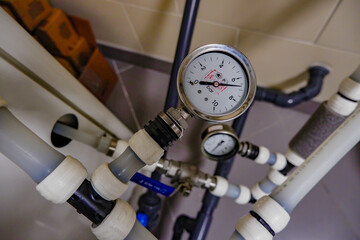 pressure gauge on the water supply pipe.