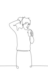 man stands with a towel on his head and a glass in his hands - one line drawing. concept of hurry to get to work or school, coffee after shower