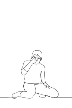 man sits on knees he looks at his tightly clenched fist - one line drawing. concept of catching insect with hand; find a jewel; consider something very small