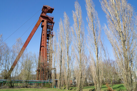 Germany, North Rhine-Westphalia, Kamen, Low angle view of abandoned shaft tower standing against clear sky