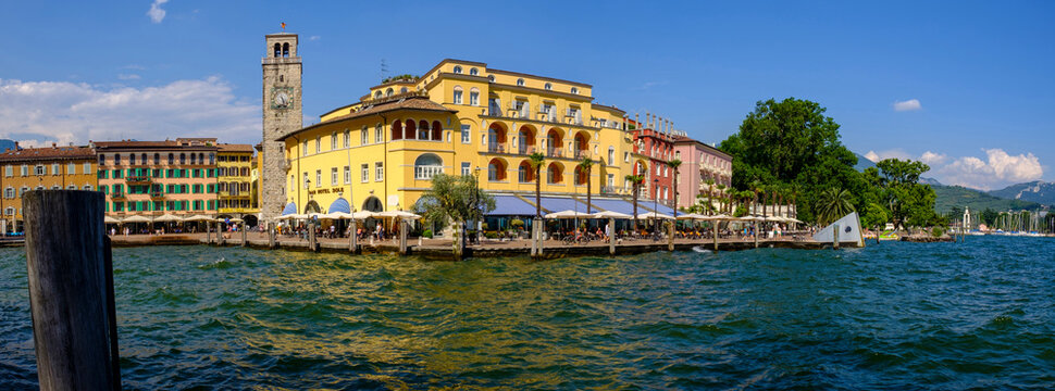 Italy, Trentino, Riva del Garda, Harbor of coastal town in summer