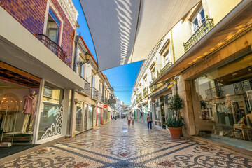 Main commercial promenade in the old town of Faro, Algarve, Portugal