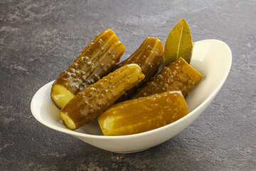 Marinated pickled cucumbers in the bowl