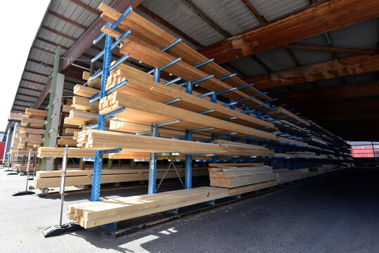 Planks stored on warehouse rack