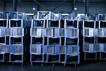 Neatly stacked steel plate raw materials inside the factory